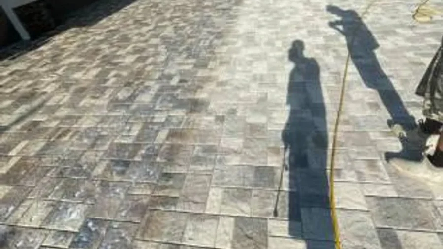 Paver surface cleaning equipment used during preparation