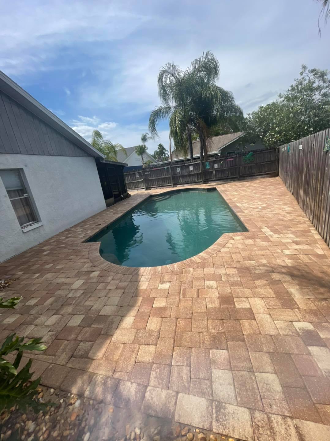 Paver pool deck after cleaning and sealing by Krystal Klean Exterior