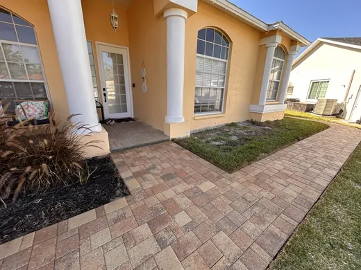New Port Richey entry pavers after cleaning, sanding and sealing