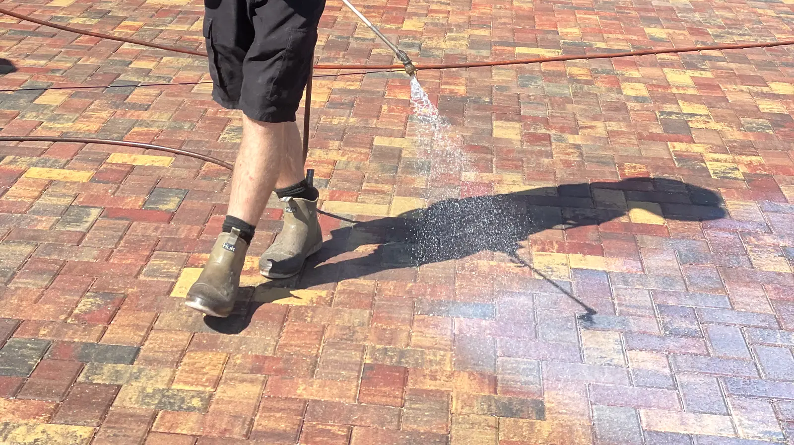 Freshly sealed brick paver surface at a Tarpon Springs, Florida home
