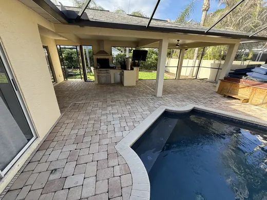 Tampa pool-deck pavers before cleaning, sanding and sealing