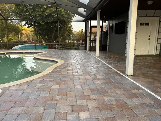 Tampa paver pool deck after stripping, prep and sealing work