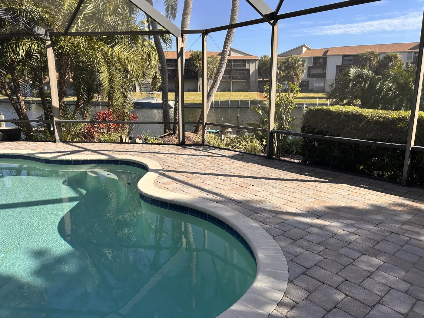 Tampa pool deck pavers before failed sealer correction
